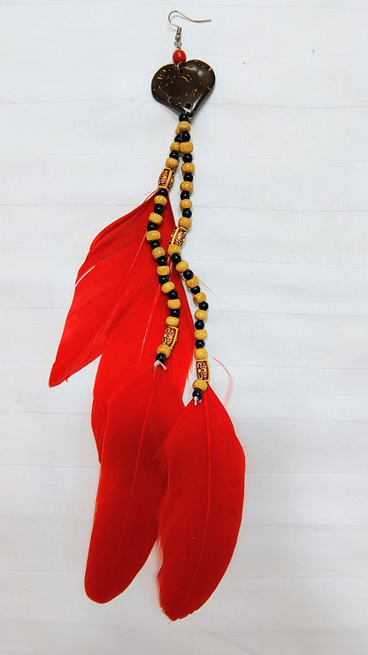 Brinco Penas e sementes Garantido