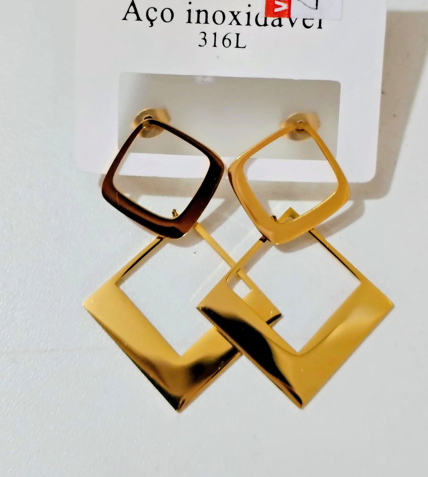 Brinco aço triângulos