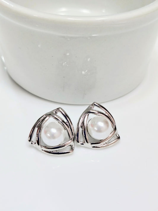 Triângulo com pérola